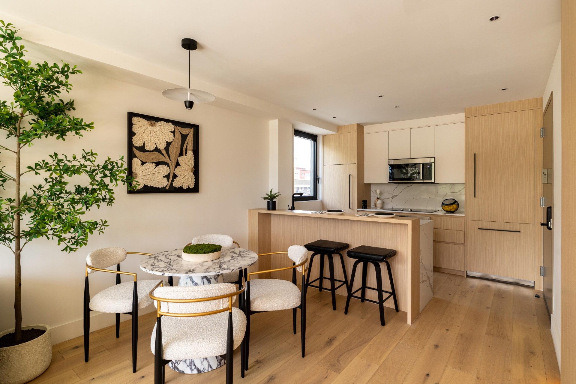Kitchen and dining with marble island