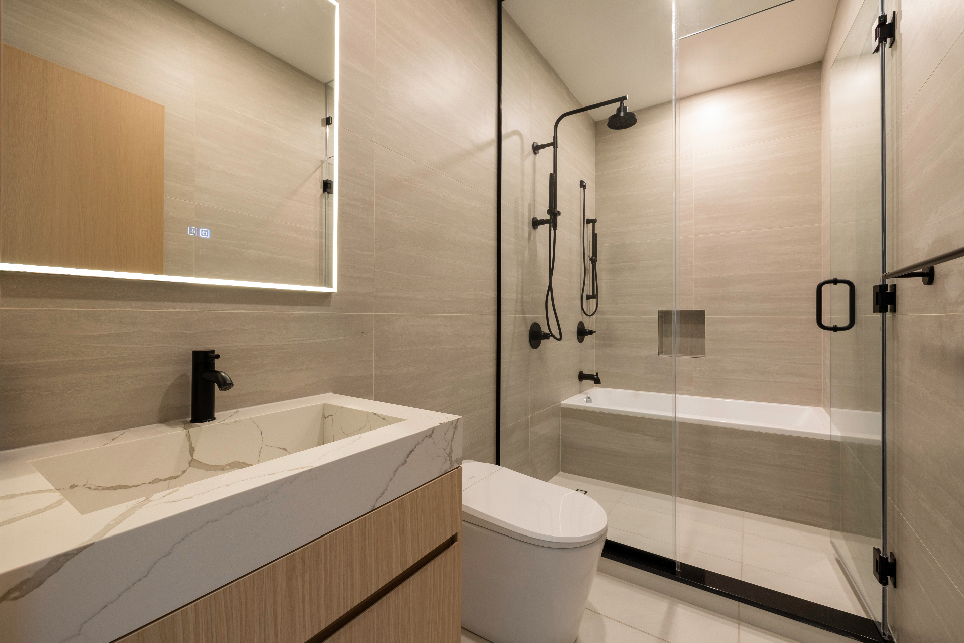 Residence 3A bathroom with soaking tub and glass shower