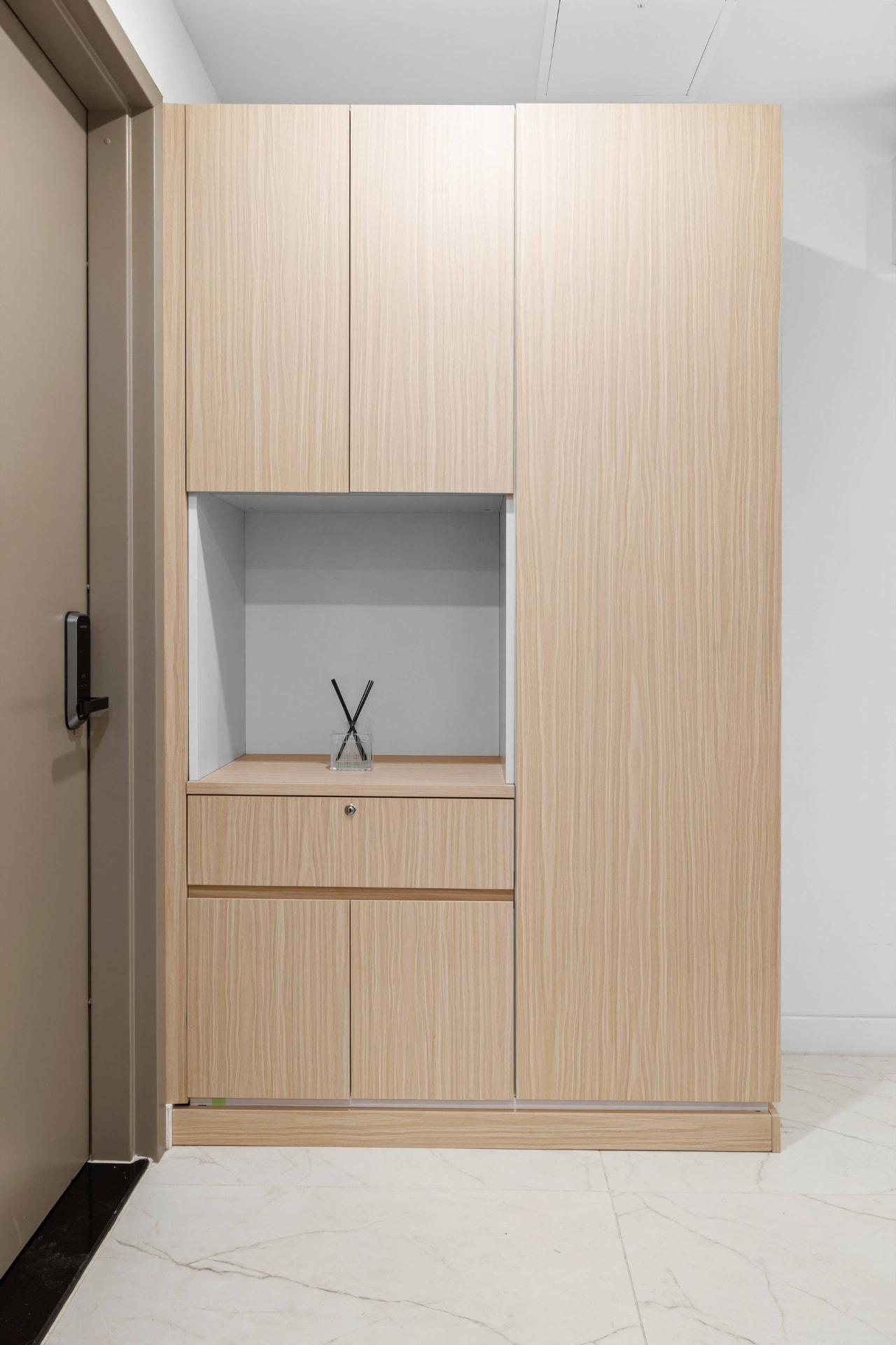 Residence 1A custom entry millwork and storage