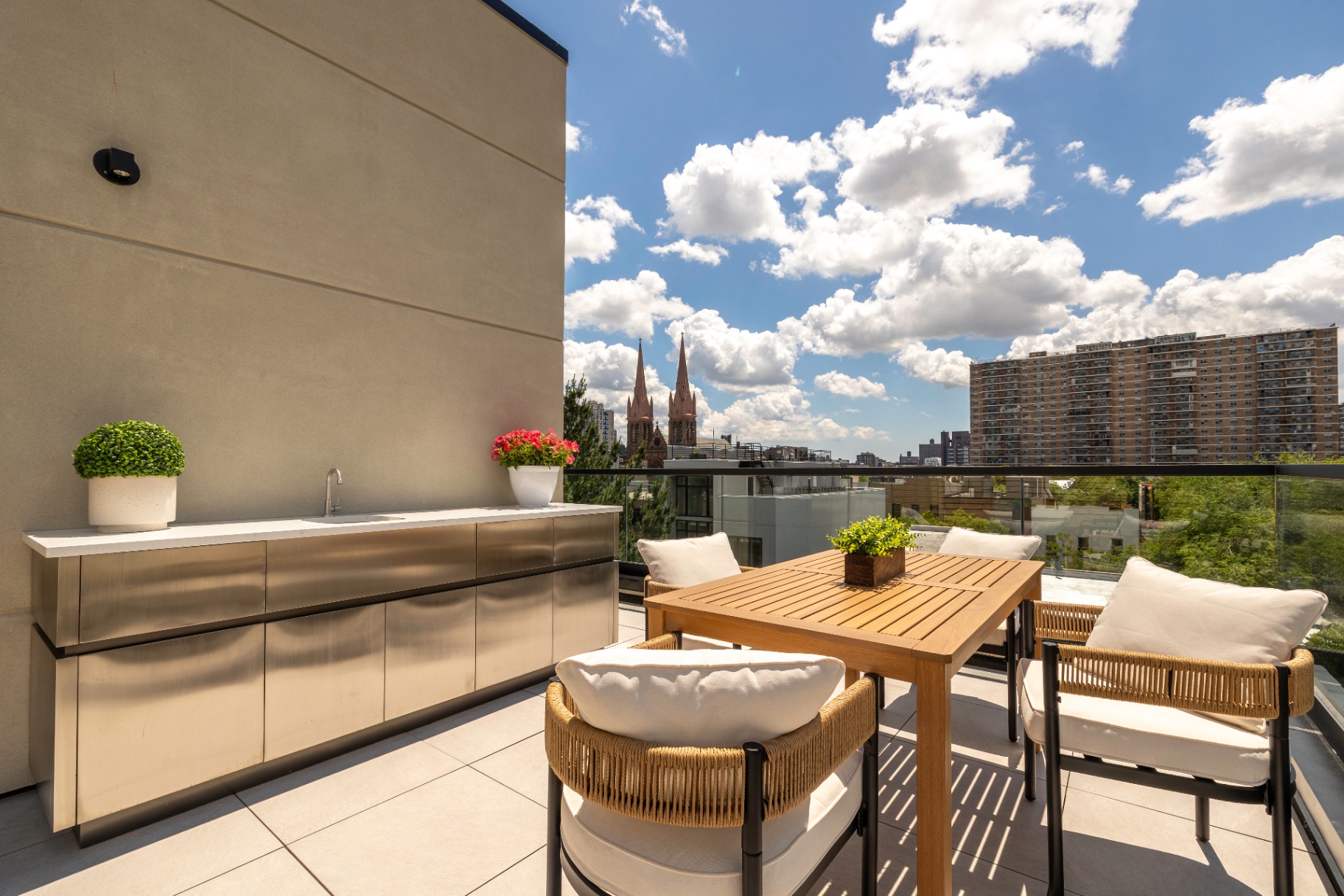 Representative — Residence 4B terrace dining with outdoor kitchen