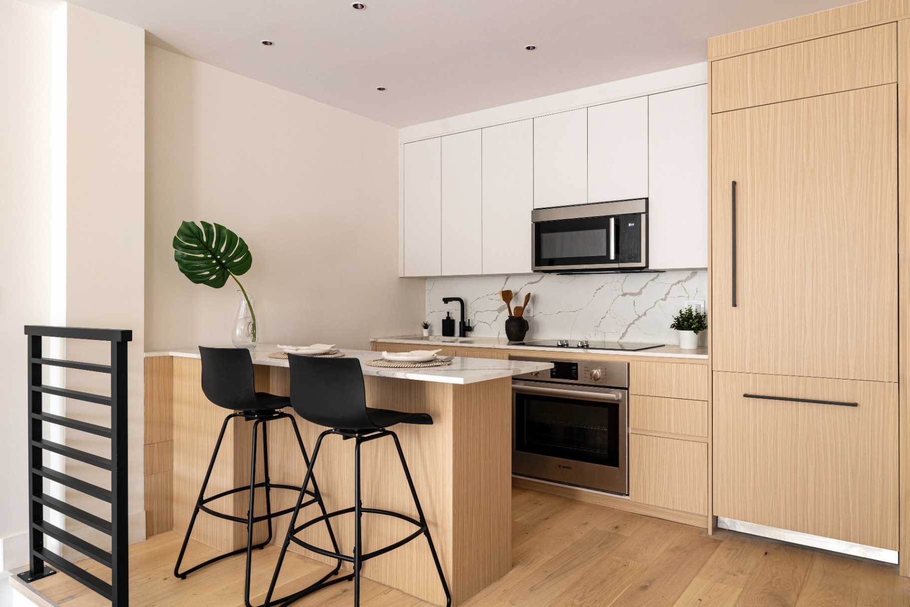 Residence 1B kitchen with paneled appliances