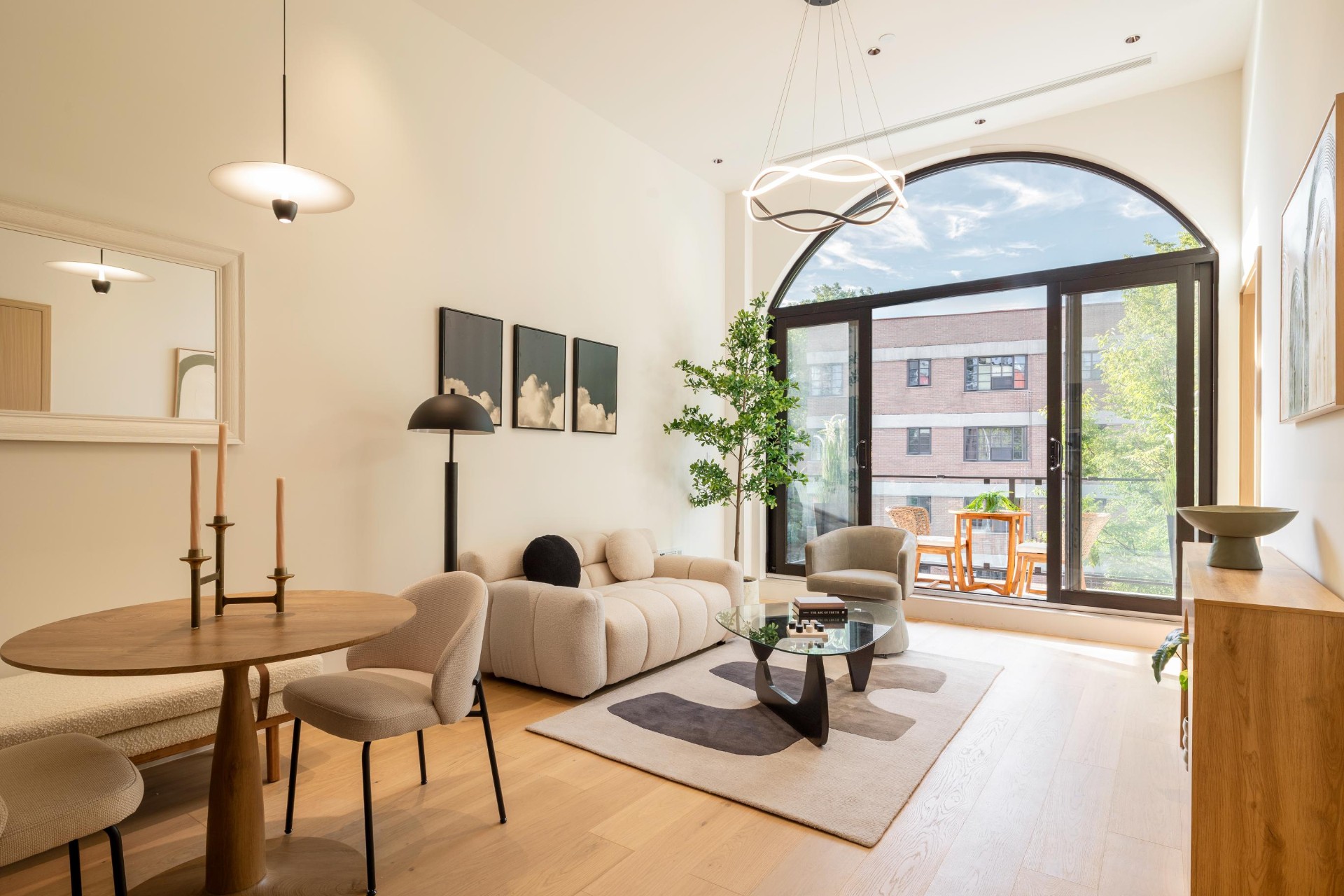 Double-height living room with arched window